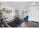 Stylish entryway with dark wood floors, a modern table, and a cozy seating area at 9497 W Stargazer Dr, Pendleton, IN 46064