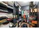 Organized walk-in closet offers ample storage with shelving and racks for clothes and accessories at 9497 W Stargazer Dr, Pendleton, IN 46064