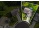 Aerial shot showcasing the home's layout with a backyard, driveway, and surrounding neighborhood at 9947 Comb Run Ct, Avon, IN 46123