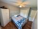 Cozy bedroom with wood-look floors and a bright ceiling fan at 9947 Comb Run Ct, Avon, IN 46123