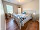 Sunlit bedroom with hardwood floors and decorative touches at 9947 Comb Run Ct, Avon, IN 46123