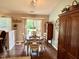 Light and bright dining area with hardwood floors and direct access to the backyard patio at 9947 Comb Run Ct, Avon, IN 46123