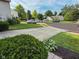 Residential street showing well-maintained lawns and homes in a suburban neighborhood at 9947 Comb Run Ct, Avon, IN 46123