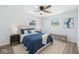 Bedroom showcasing a ceiling fan, natural light, and stylish decor at 1011 Robin Dr, Anderson, IN 46013