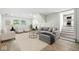 Living room features hardwood floors, recessed lighting, and comfortable seating at 1011 Robin Dr, Anderson, IN 46013