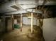 Basement with concrete pillars and a small window at 1016 W 31St St, Indianapolis, IN 46208