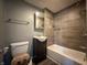 Bathroom featuring tub and vanity at 1016 W 31St St, Indianapolis, IN 46208