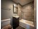 Bathroom featuring tub and vanity at 1016 W 31St St, Indianapolis, IN 46208