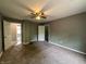 Bedroom featuring plush carpet, neutral paint, and a ceiling fan for added comfort at 1016 W 31St St, Indianapolis, IN 46208