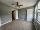 Bedroom featuring neutral walls, carpet, and natural light from a large window at 1016 W 31St St, Indianapolis, IN 46208