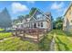 Charming home featuring a spacious front yard and covered porch at 1016 W 31St St, Indianapolis, IN 46208
