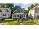 Charming home featuring a spacious front yard and covered porch at 1016 W 31St St, Indianapolis, IN 46208