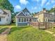 Charming home with a spacious front yard and cozy porch at 1016 W 31St St, Indianapolis, IN 46208