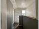 Hallway featuring a window and gray paint near the entryway at 1016 W 31St St, Indianapolis, IN 46208
