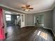 Open concept living room with hardwood floors and staircase at 1016 W 31St St, Indianapolis, IN 46208