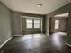Spacious living room with natural light and gray walls at 1016 W 31St St, Indianapolis, IN 46208