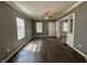 Comfortable living room with hardwood floors and large windows at 1016 W 31St St, Indianapolis, IN 46208