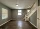Living room featuring hardwood floors and staircase at 1016 W 31St St, Indianapolis, IN 46208