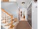 Inviting foyer with a staircase, stylish entryway, and a glimpse into the adjoining rooms at 10198 N State Road 75, North Salem, IN 46165