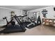 Well-equipped home gym with treadmill, weight rack, and workout accessories at 10198 N State Road 75, North Salem, IN 46165