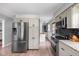 Spacious kitchen with stainless steel refrigerator and modern appliances at 10198 N State Road 75, North Salem, IN 46165