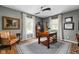 Comfortable office with hard wood flooring, desk, and natural light at 10198 N State Road 75, North Salem, IN 46165