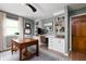Bright office with hardwood floors, custom built-in bookcases and cabinets at 10198 N State Road 75, North Salem, IN 46165