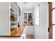 Well-stocked walk-in pantry with custom shelves and wood countertop at 10198 N State Road 75, North Salem, IN 46165