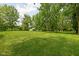 Beautiful expansive yard with mature trees and plenty of space for recreation at 10198 N State Road 75, North Salem, IN 46165