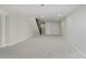 Spacious carpeted basement with recessed lighting, white walls, and a doorway to the utility area at 10434 N Delaware St, Carmel, IN 46280