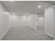 Finished basement with recessed lighting and neutral-colored walls and carpeting at 10434 N Delaware St, Carmel, IN 46280