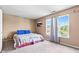 Simple bedroom featuring large windows allowing for great natural light at 10611 Armstead Ave, Indianapolis, IN 46234
