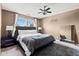 Bedroom with great natural light, ceiling fan and plush carpet flooring at 10611 Armstead Ave, Indianapolis, IN 46234