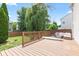 Large wooden deck with an outdoor seating area perfect for entertaining and relaxing at 10611 Armstead Ave, Indianapolis, IN 46234