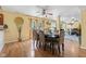 Inviting dining area featuring a wooden table set, stylish decor, and natural light at 10611 Armstead Ave, Indianapolis, IN 46234