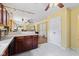 Spacious kitchen with custom cabinets, stainless steel appliances, and long countertops at 10611 Armstead Ave, Indianapolis, IN 46234