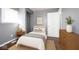 Cozy bedroom with closet, window, stylish decor, and ample natural light at 1217 S Ewing St, Indianapolis, IN 46203