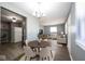 Open-concept dining area connected to the living room and kitchen at 1217 S Ewing St, Indianapolis, IN 46203