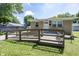Charming brick home with a convenient front access ramp, perfect accessibility and curb appeal at 1217 S Ewing St, Indianapolis, IN 46203