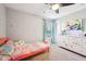 Colorful bedroom featuring bright decor, a cozy bed, and playful accents, perfect for inspiring creativity at 12404 Guy Way, Indianapolis, IN 46236