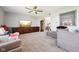Comfortable living room with a large entertainment center and a cozy seating area at 12404 Guy Way, Indianapolis, IN 46236