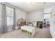 Bright playroom with large window, play furniture, and plenty of natural light at 12404 Guy Way, Indianapolis, IN 46236