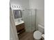Bathroom with a vanity, mirror, toilet, and shower with a glass enclosure at 1256 Kappes St, Indianapolis, IN 46221