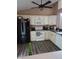 Well-equipped kitchen with modern appliances and ample counter space at 1311 Flintlock Dr, Greenwood, IN 46143