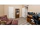 Home office with Colts Ave sign, desk, and comfortable seating at 1311 Flintlock Dr, Greenwood, IN 46143