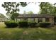 Charming single-story home with mature landscaping and a classic design at 1325 N Gavin St, Muncie, IN 47303