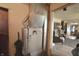 Indoor shot of the furnace with a vacuum cleaner nearby and a room in the background at 1325 N Gavin St, Muncie, IN 47303