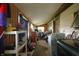 Laundry area with washer and dryer amidst storage items at 1325 N Gavin St, Muncie, IN 47303
