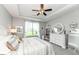 A cozy bedroom provides natural light with modern decorations and a comfortable aesthetic at 13427 Merryvale St, Fishers, IN 46037