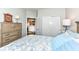 Well-lit bedroom featuring a large closet, neutral walls, and an adjacent room at 13427 Merryvale St, Fishers, IN 46037